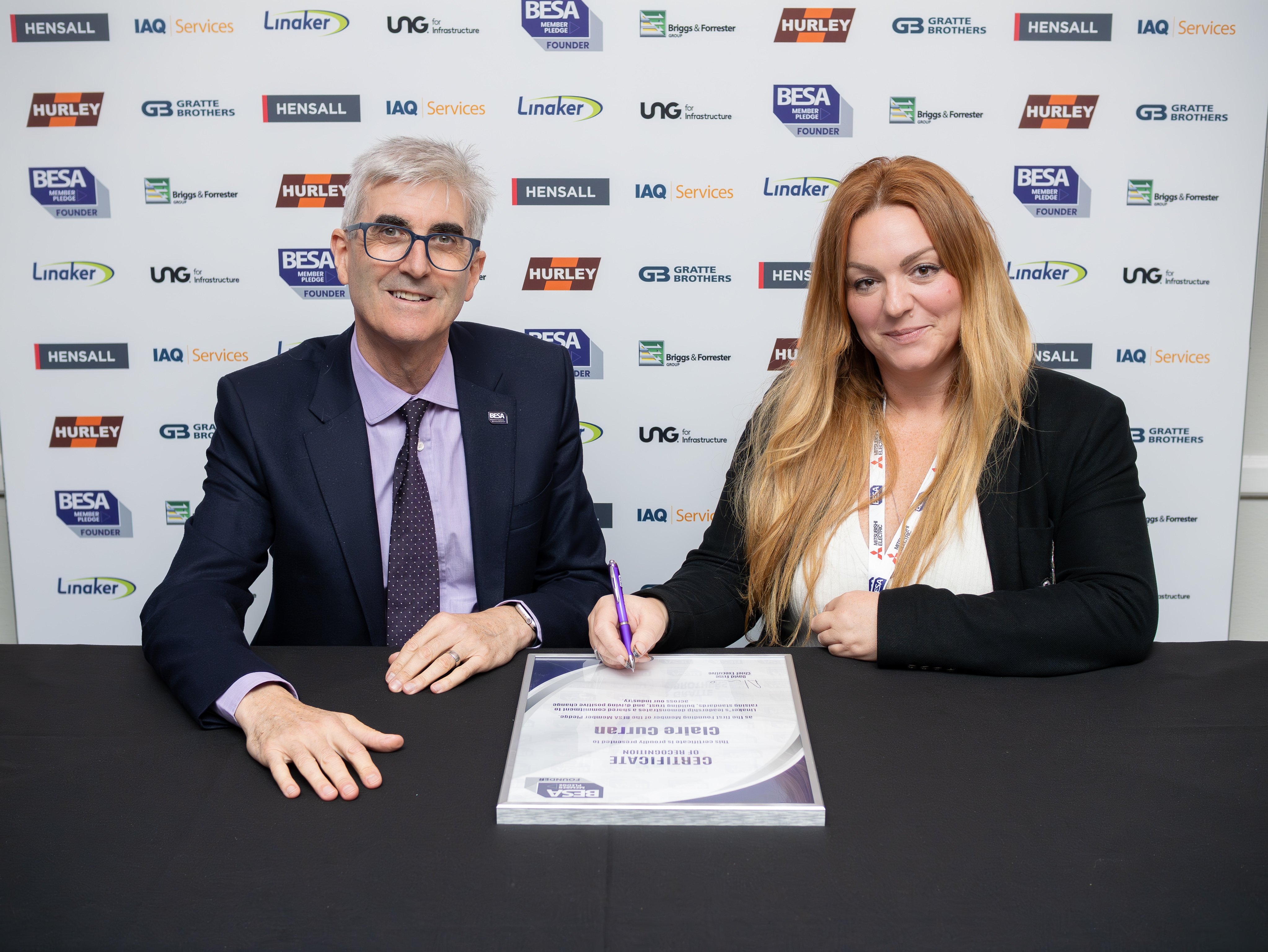 Linaker signing Member Pledge