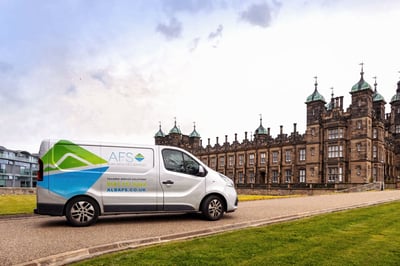 Alba Facilities Services van parked outside a client building, symbolising reliable service under the 4-day workweek model.