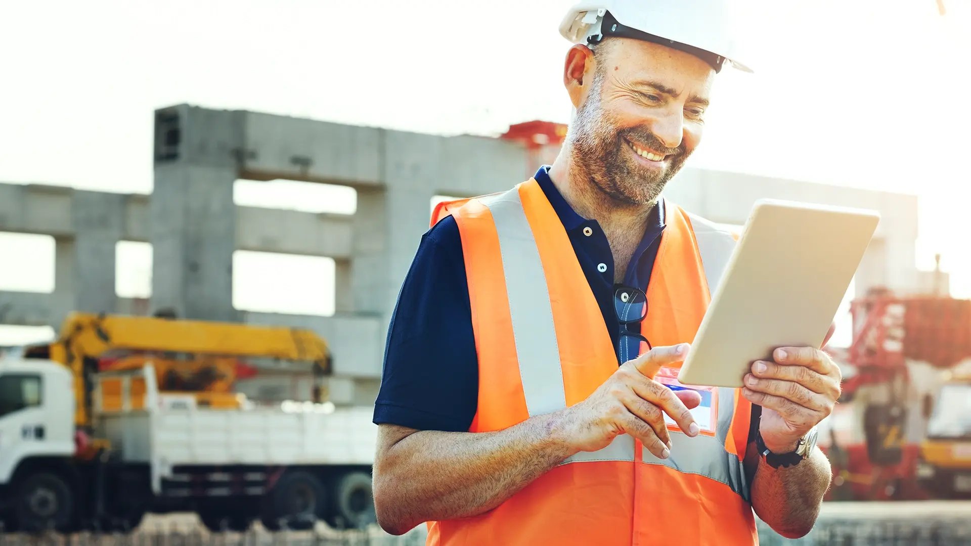 Building services engineer accessing technical training online