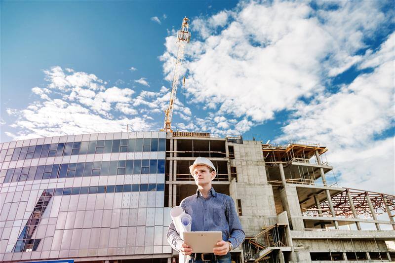 construction-manager-controlling-building-site-wit-2022-12-16-21-52-05-utc-1